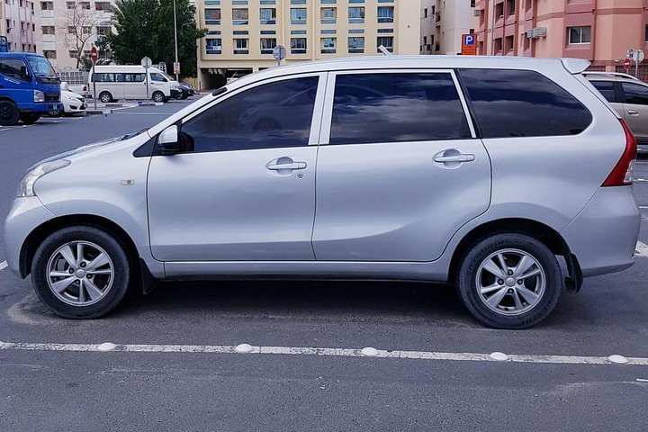 Explore Dubai and beyond in comfort with a 7-seater minivan at your service. Perfect for family adventures or group outings making every journey easy and enjoyable.